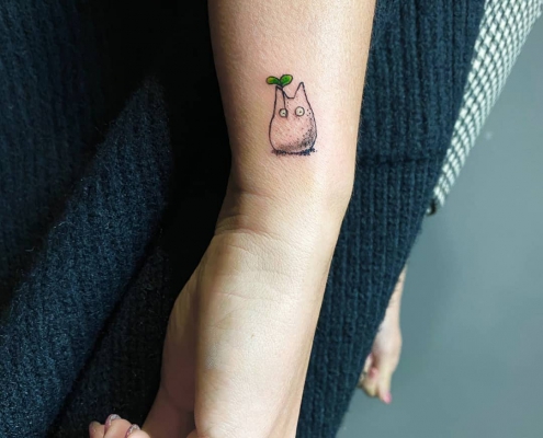 LED Totoro fine line dotwork tattoo by artist Cesarina Gretha (Sanne Bosscher)
