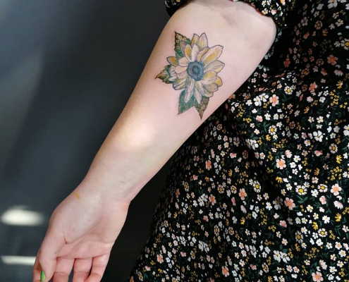 Custom Sunflower fine line dotwork tattoo by artist Cesarina Gretha (Sanne Bosscher)