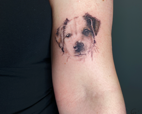 Custom portrait of Gracie the dog fine line dotwork tattoo by artist Cesarina Gretha (Sanne Bosscher)